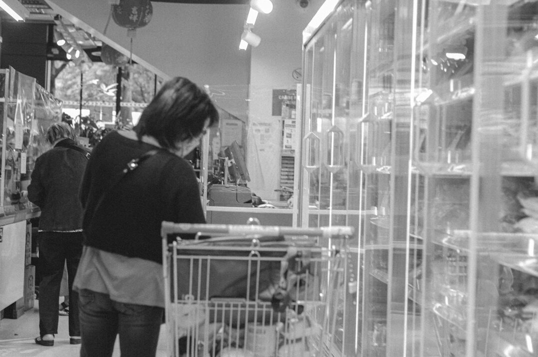 detective observing shopper in store
