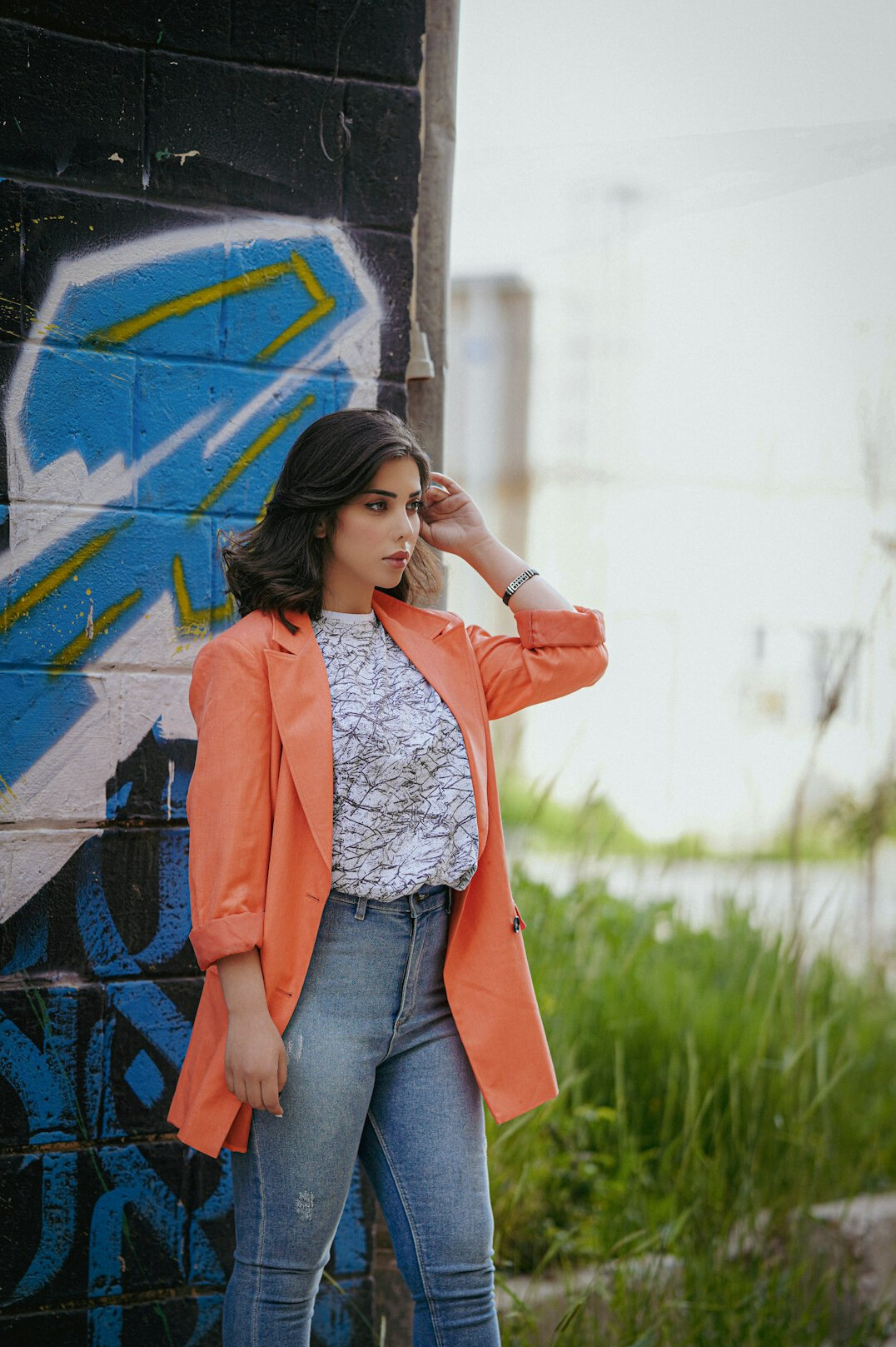 Portrait of a Latina woman editor in a blazer