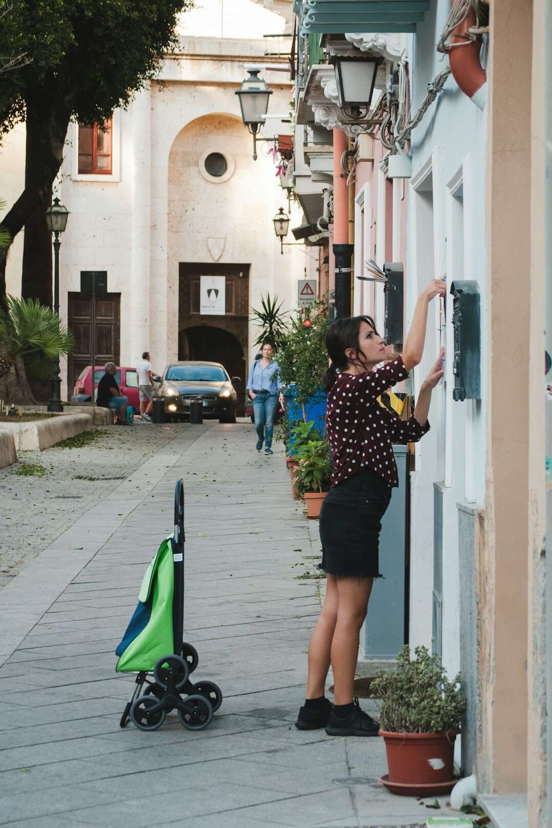 woman with baby stroller in store